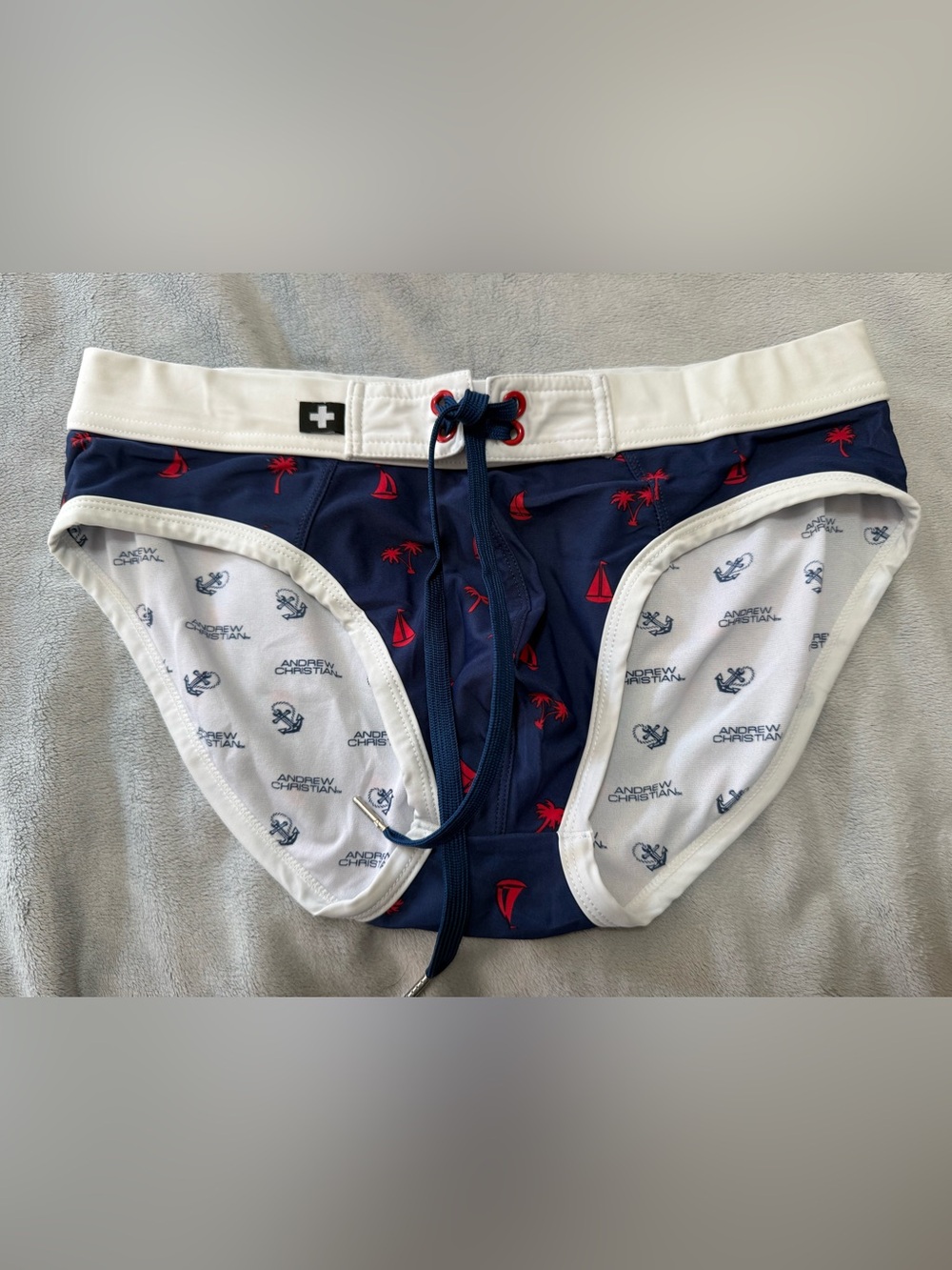 Andrew Christian Men's Navy Blue Tropical Print lined Swim Briefs. Size large.